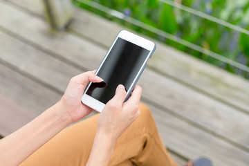 Woman hold with cellphone