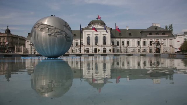 Presidential palace in Bratislava, Slovakia reflected in  water of fountain
