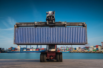 Forklift handling container box loading