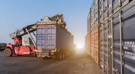 Forklift handling the containers box