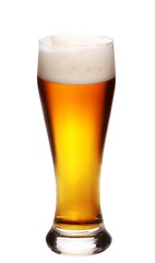 Glass of light beer isolated on white background