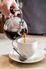 barista making coffee
