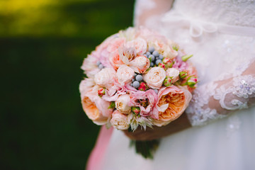 Pink wedding bouquet of peony and roses. Soft handmade for the bride