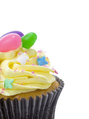 cupcake with yellow vanilla icing