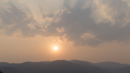 Fototapeta na wymiar sunset on mountain hill