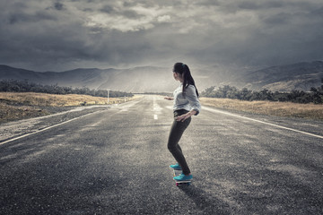 Girl ride skateboard