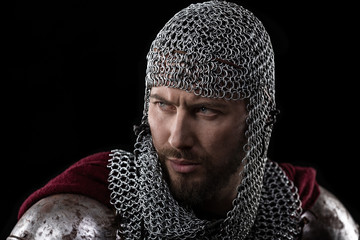 Medieval Warrior with chain mail armour and red Cloak