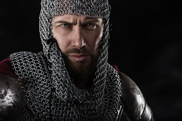 Medieval Warrior with chain mail armour and red Cloak