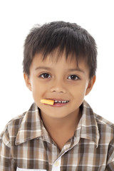 elementary boy eating candy.