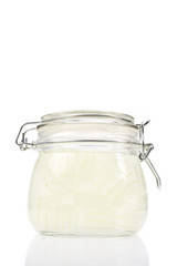 A glass bowl full of freshly picked Aloe vera plant, peeled and