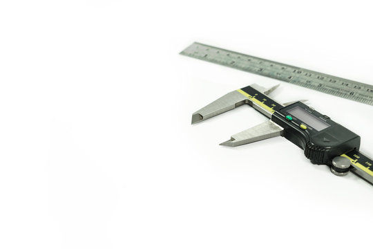 Digital Electronic Vernier Caliper and ruler, isolated on white