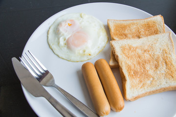 Hotel breakfast set Includes eggs  sausage toast coffee