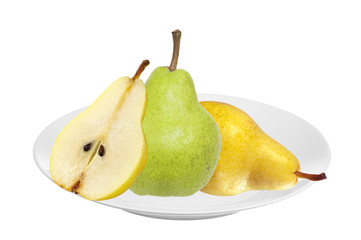 Beautiful fresh green and yellow pears on plate isolated on whit