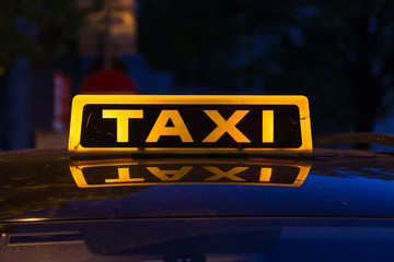 Typical Taxi Sign on a Car