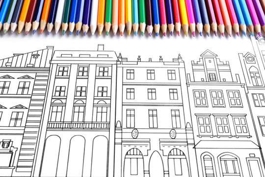 Adult anti stress coloring with crayons closeup
