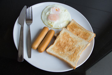 Hotel breakfast set Includes eggs  sausage toast coffee