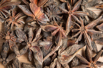 close up pile of anise seed as a background