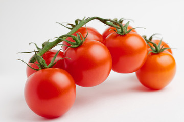 cherry tomatoes on white background