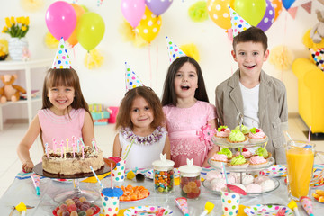 Happy group of children at birthday party