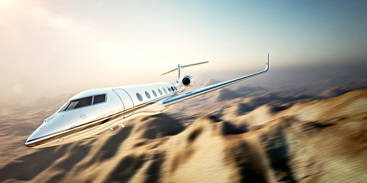 Image of white modern and luxury generic design private jet flying in blue sky at sunset.Uninhabited desert mountains background.Business travel picture.Horizontal,motion blurred effect.3d rendering