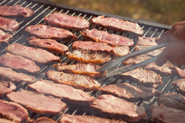 Roasted meat on the grill, parrilla, asado