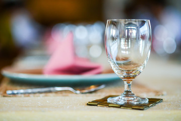 Table decoration for meal time , Empty glasses set in restaurant