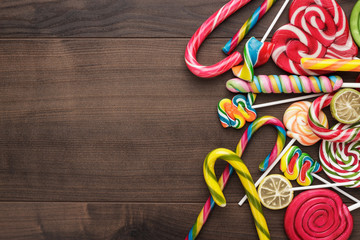 different colorful sweets and lollipops on the table