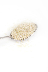 sesame seeds in spoon