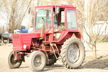 Red tractor on a farm