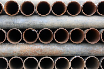 Metal pipes stacked background