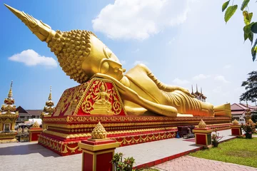 Foto op Canvas Reclining Buddha statue at Wat Pha That Luang, Vientiane, Laos. © R.M. Nunes