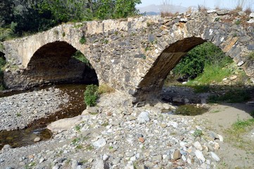 Fototapeta na wymiar Very former bridge in stones.