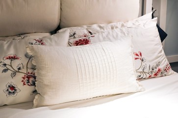 Vintage White Pillows on A Comfortable Bed
