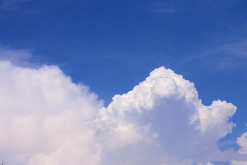 Naklejka na ściany i meble Beautiful big white cloud and bright blue pure sky at sunny day