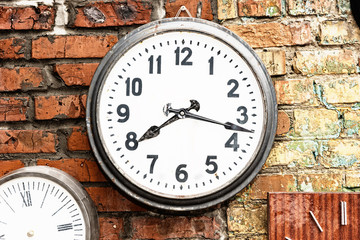 Clock on Exterior Brick Wall