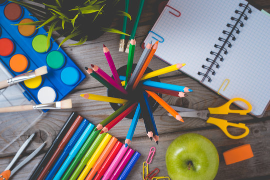 School supplies on wooden table. Close up