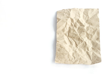 Fototapeta na wymiar Brown crumpled paper texture on white background.