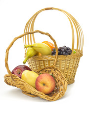 tasty summer fruits in backet isolated on white