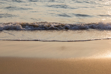 Wave and sand on the beach