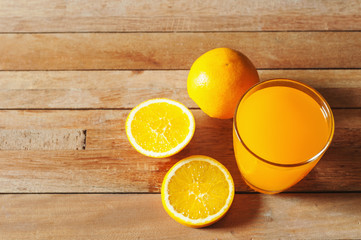 Orange juice and fresh orange