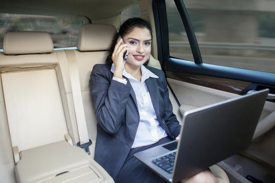 Indian female worker in the car