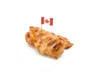 chicken with sauce and a canadian flag