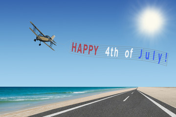 happy 4th of july plane banner announcement over beach with blue sky - obrazy, fototapety, plakaty