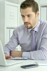 businessman working with laptop in office