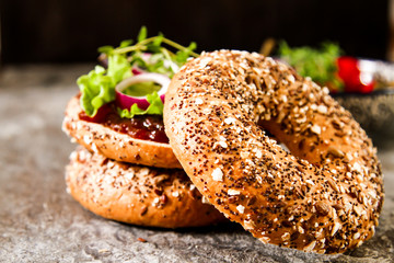vegan bagel made at home with lettuce and sauce