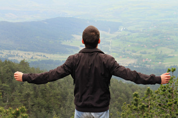 Freedom concept, Man enjoying mountain view