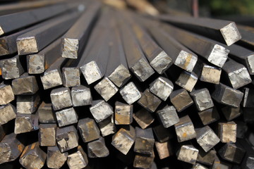 Hot rolled steel. Carbon bar. Rectangular metal. Rolled stock. Square iron stock.  Square bar. Hot-rolled steel quadrate