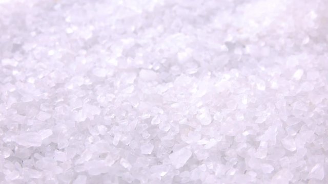 Portion of rotating Coarse Salt as not loopable 4K footage
