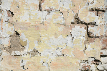 Background of yellow and red old brick wall texture