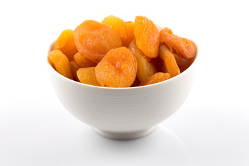 Dried apricots on white background